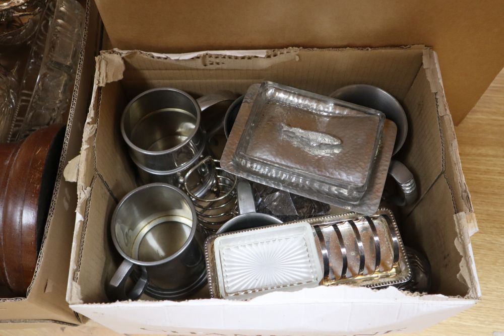 A quantity of silver plated including two silver plated tea sets, a salver and a two branch candelabra and cutlery, in a trunk